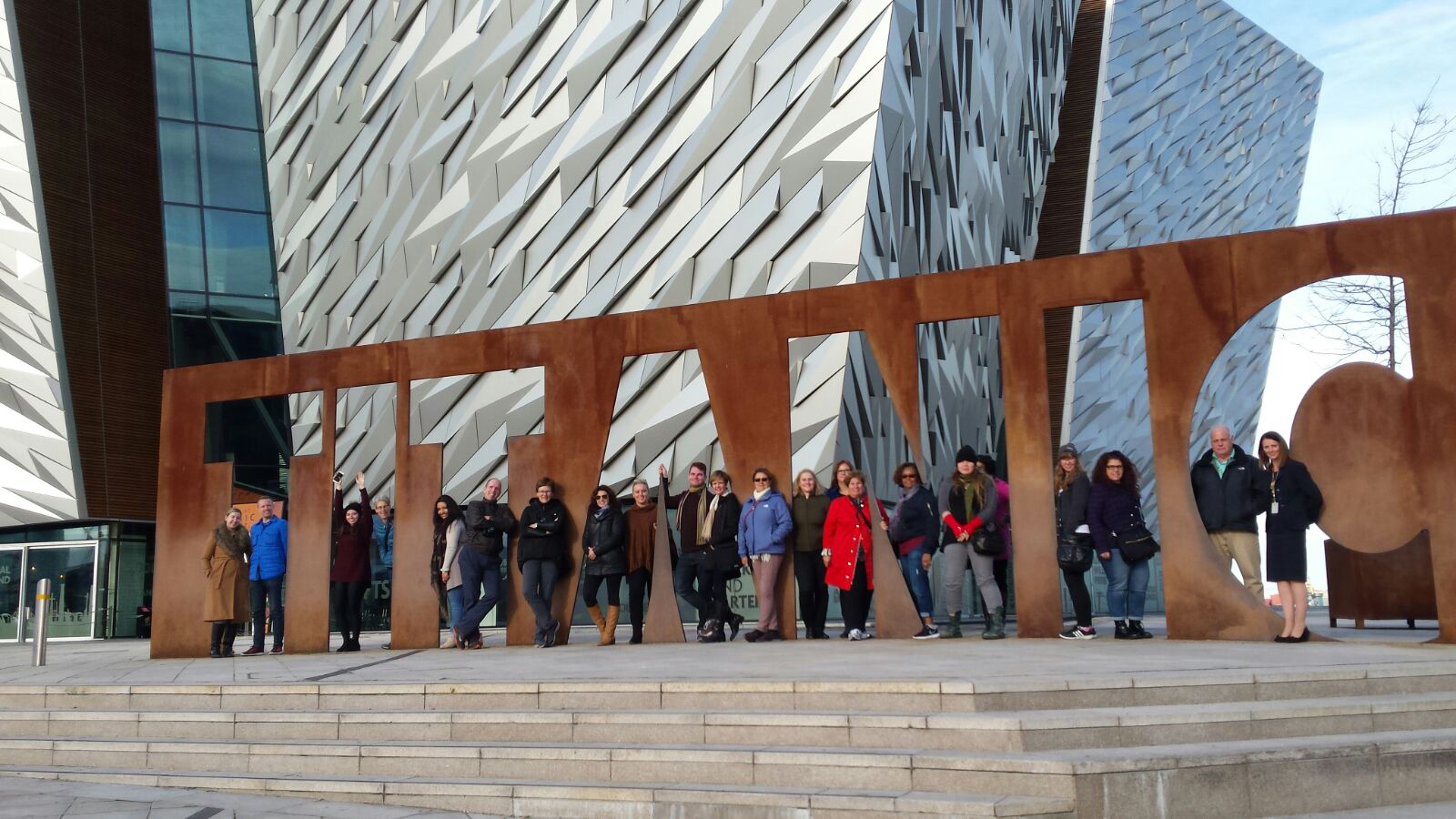 Assumpta O’Neill (right) welcomes Canadian tour operators and travel agents and Kate Smith, Tourism Ireland (left), to Titanic Belfast